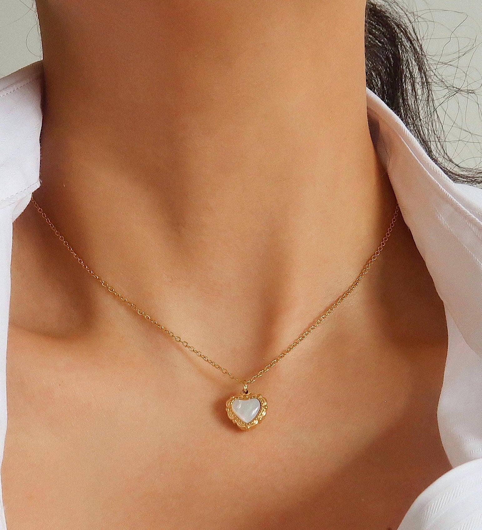 Vintage-inspired necklace crafted from premium stainless steel, featuring a classic heart pendant (0.5 inch diameter) on a 15.5-inch chain with a 2-inch extender. Hypoallergenic, water- and tarnish-resistant—perfect for adding nostalgic charm and timeless elegance to any jewellery collection.