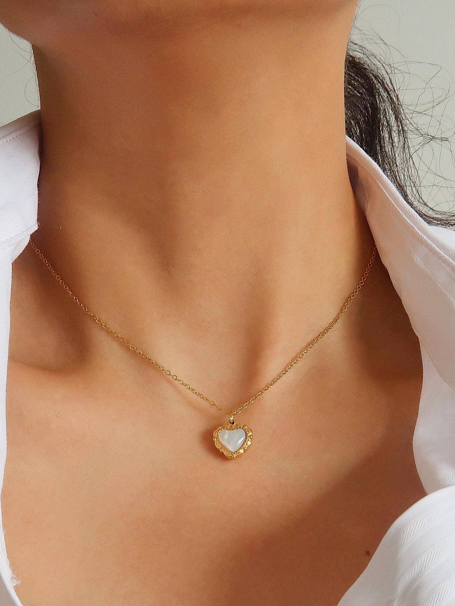 Vintage-inspired necklace crafted from premium stainless steel, featuring a classic heart pendant (0.5 inch diameter) on a 15.5-inch chain with a 2-inch extender. Hypoallergenic, water- and tarnish-resistant—perfect for adding nostalgic charm and timeless elegance to any jewellery collection.